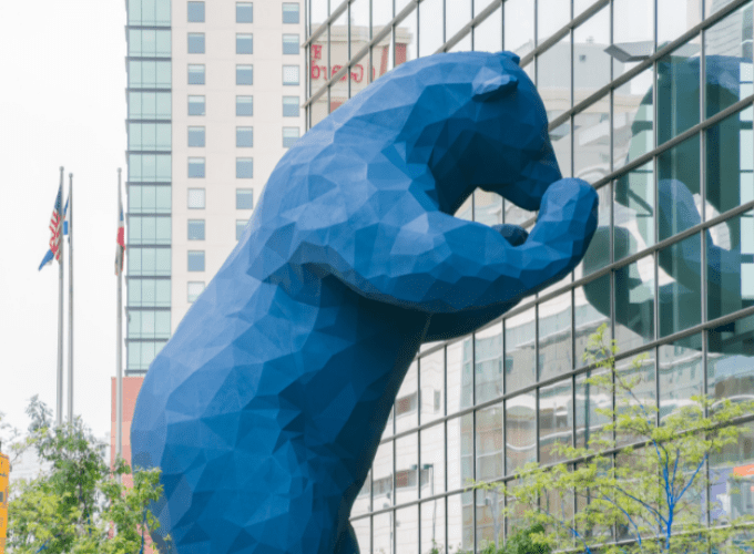 Denver's 40-ft Big Blue Bear statue peering into Colorado's Convention Center