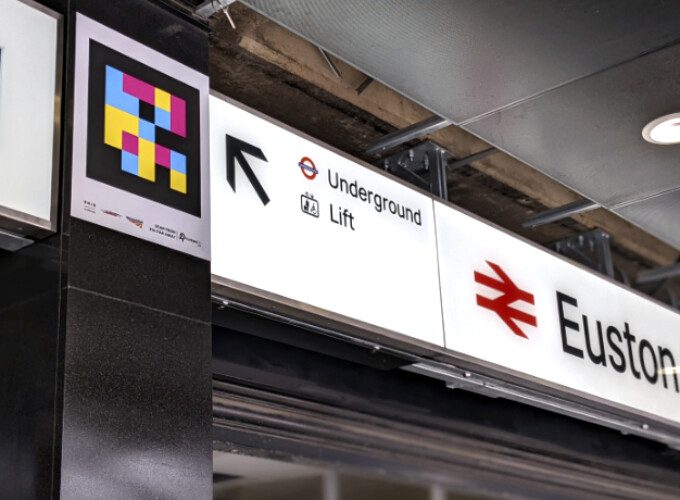 Icomera's transport accessibility solution Visor at London Euston station - Showing a BIDI code positioned on a wall to help passengers with sight loss navigate