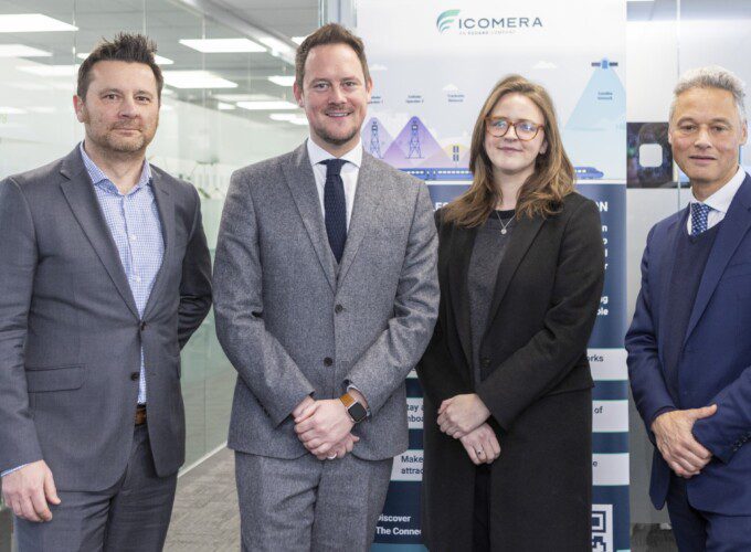 Stephen Morgan MP and Councillor Lauren Edwards pose alongside Icomera's Peter Kingsland and Roger Matthews