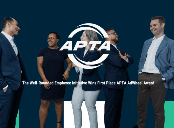 APTA - The Well_rounded Employee Initiative Wins First Place APTA AdWheel Award. A diverse range of Icomera employees stand behind the text, laughing with one another.