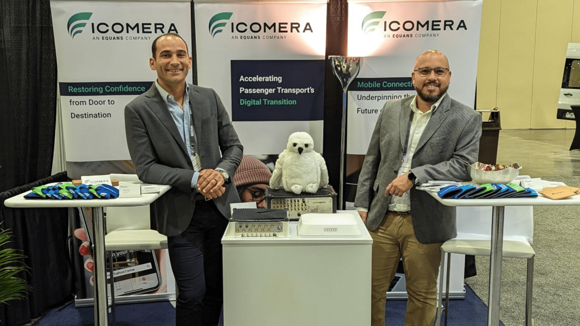 Icomera employees at a trade show stand